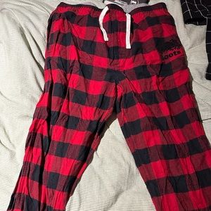 Red and black roots pants